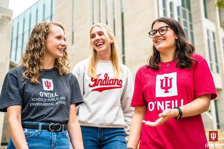 Three O'Neill students walking on campus.